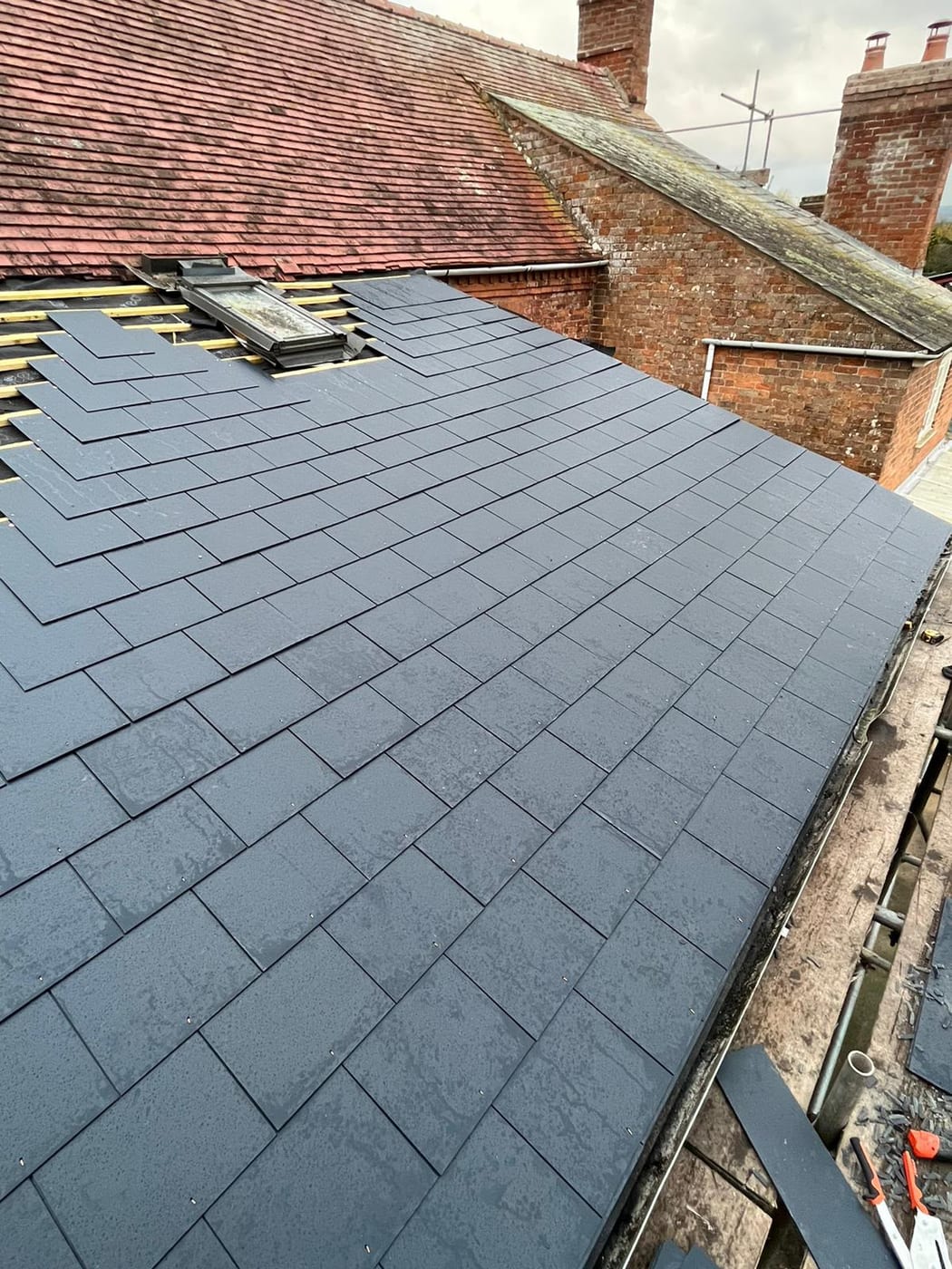 Photo of a TB Rooflines roofer on site, add a real photo